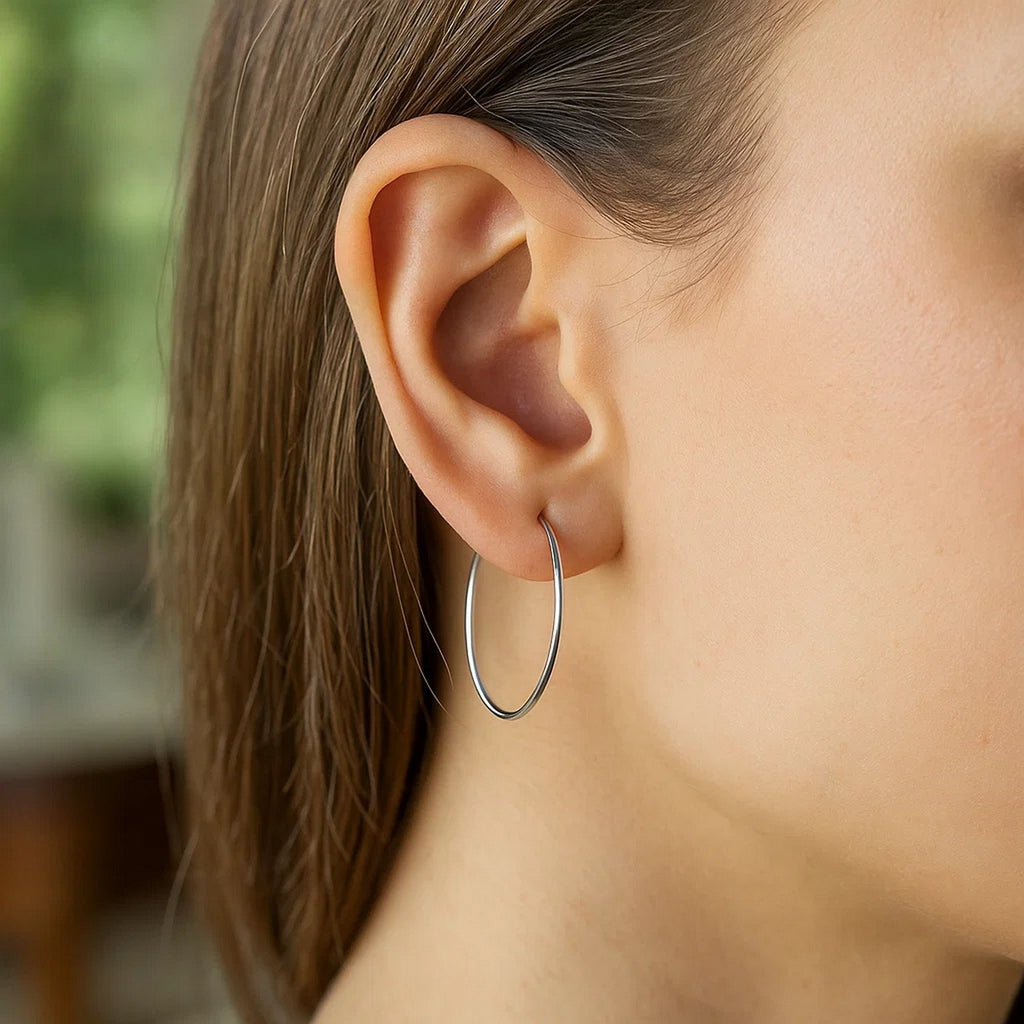 10k White Gold Polished Hoop Earrings (1.5x25 mm)